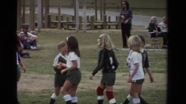 1981: girls handshaking with opponent team CALIFORNIA
