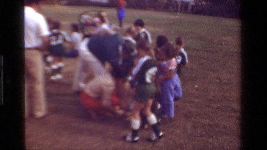 1981: children gathered around girls and eating CALIFORNIA