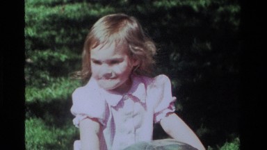 1979: A Cute Little Girl in Pink Rides a Toy in a California Park