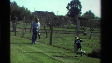 1981: daughter and father playing football CALIFORNIA