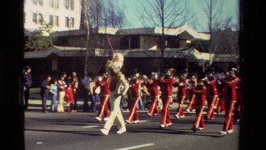 1981: Marching Band Parades Down City Street in California
