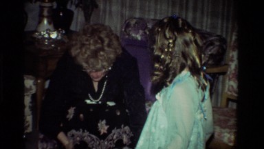 1981: A Little Girl Watching Her Grandma Open Presents on Christmas California