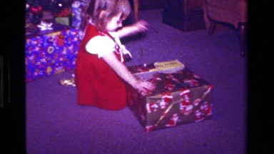 1979: A Small Girl Searching Her School Bag in California