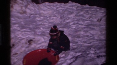 1981: A Cute Little Boy Trying to Get Into the Skating Tube on Ice California