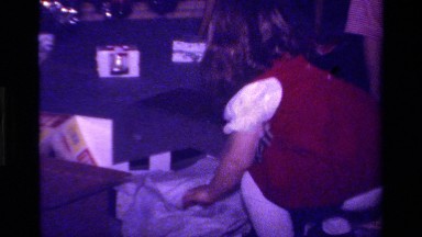 1979: A Small Kid Playing with Her Dresses with Her Mother in California