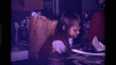 1979: kid picks up dropped spoon on floor proudly shows mother CALIFORNIA