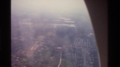 1984: Aerial View of a City with Many Trees, Parks and Monuments Thailand