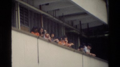 1984: A Group of People Watching Outside Standing on Their Home Balcony