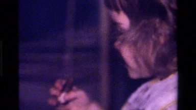 1979: a baby is eating delicious chocolate CALIFORNIA