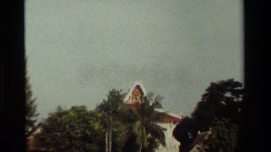 1984: church with palm trees near water THAILAND
