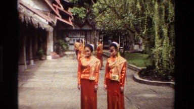 1984: women in silk dresses at a temple in southeast asia THAILAND