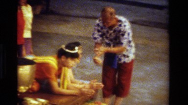 1984: group of people dressed in traditional clothing take part in a ceremony