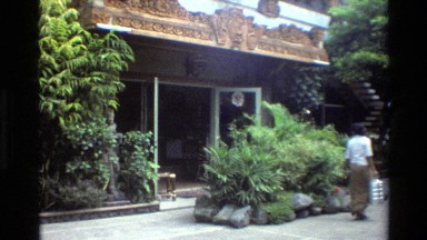1984: A Woman Walks Past a Building in Singapore