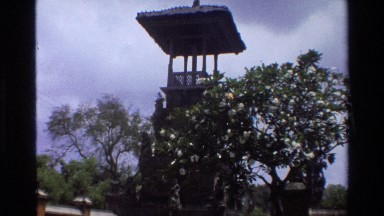 1984: Two People Talking in Campus Area of Large Building Singapore