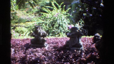 1984: Statues of Gods and Goddesses Resting on a Bed of Beautiful Flowers