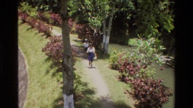 1984: two people walking a path through a park SINGAPORE