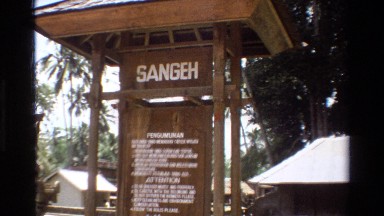 1984: signs beckon visitors' attention at indonesia's sangeh monkey forest