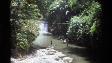 1984: waterfall into a river with people crossing SINGAPORE