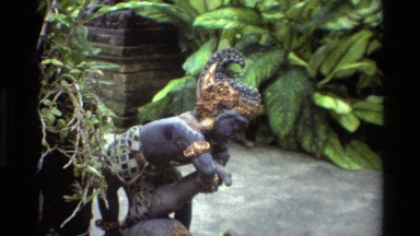 1984: Bending Stone Statue with Curved Nose and Headdress Defeats Enemy Underneath
