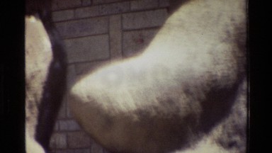 1983: a stone statue of a full figured woman holding a child NAIROBI KENYA