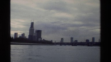 1984: A Large Waterway Flanked by Buildings in Singapore