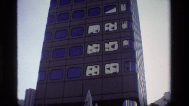1984: a fountain with "peak tram" spelled out in shiny letters HONG KONG