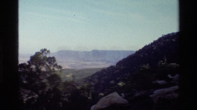 1983: a large mountain looms over a deep and vast valley MARA TANZANIA