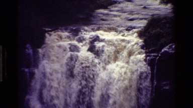 1983: Fast Flowing Waterfall View from Above Kenya