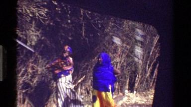 1983: two young girls stare at the camera in an exotic locale KENYA