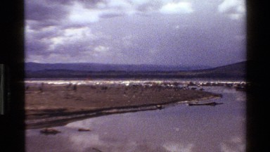 1983: A Still Lake Reflects the Blue Sky and Clouds Above Mara Tanzania