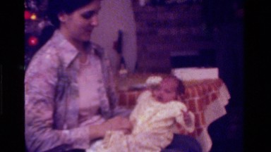 1975: mother caring his child CALIFORNIA