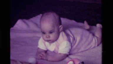 1975: baby laying on a blanket CALIFORNIA