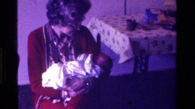 1975: new born baby with grandmother CALIFORNIA