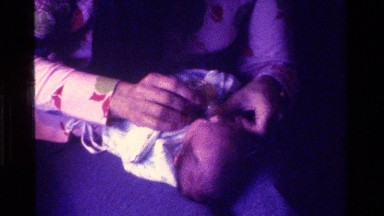 1975: putting a paci in a babys mouth. CALIFORNIA