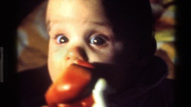 1977: cute baby playing with toy CALIFORNIA