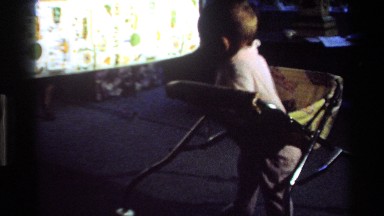 1977: A Baby Moving and Bouncing in a Bouncer, California