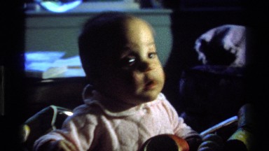 1977: a baby looking around curious CALIFORNIA
