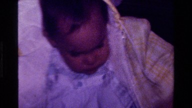 1977: cute baby wearing a jacket enjoying playtime CALIFORNIA
