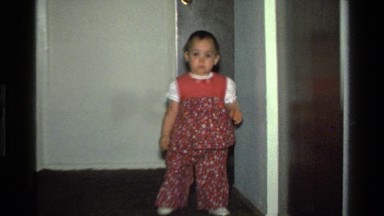 1977: baby sees camera and shyly runs away CALIFORNIA