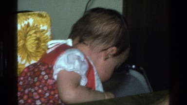 1977: cranky baby at dinner table CALIFORNIA