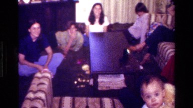 1977: a family gathered in the living room CALIFORNIA