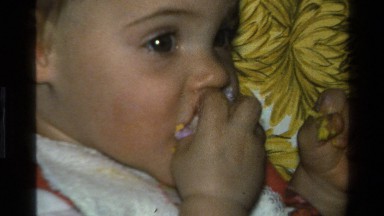 1977: a cute baby is eating something CALIFORNIA
