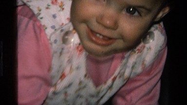 1977: a baby stuffing her head in a pillow CALIFORNIA