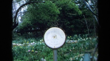 1969: a round white sign for mclaughlins private & garden CALIFORNIA