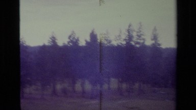 1977: A Fast Moving Vehicle Driving Past the Countryside Big Bear California