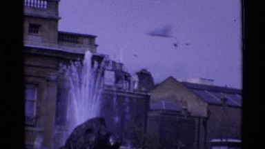1969: A Landmark Building in the Middle of Busy London with Fountain and Birds