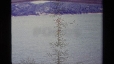1977: Waterskiing in a Reservoir with Adjacent Hills Lake Elsinore California