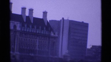 1969: A Panoramic View of London with Water, Bridges, and Historic Buildings