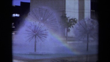 1969: Rainbow Casts Over Flower-Shaped Fountains in Sacramento Park