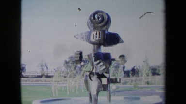 1969: A Beautiful Statue With Water Flowing Surrounded by Grass Sacramento